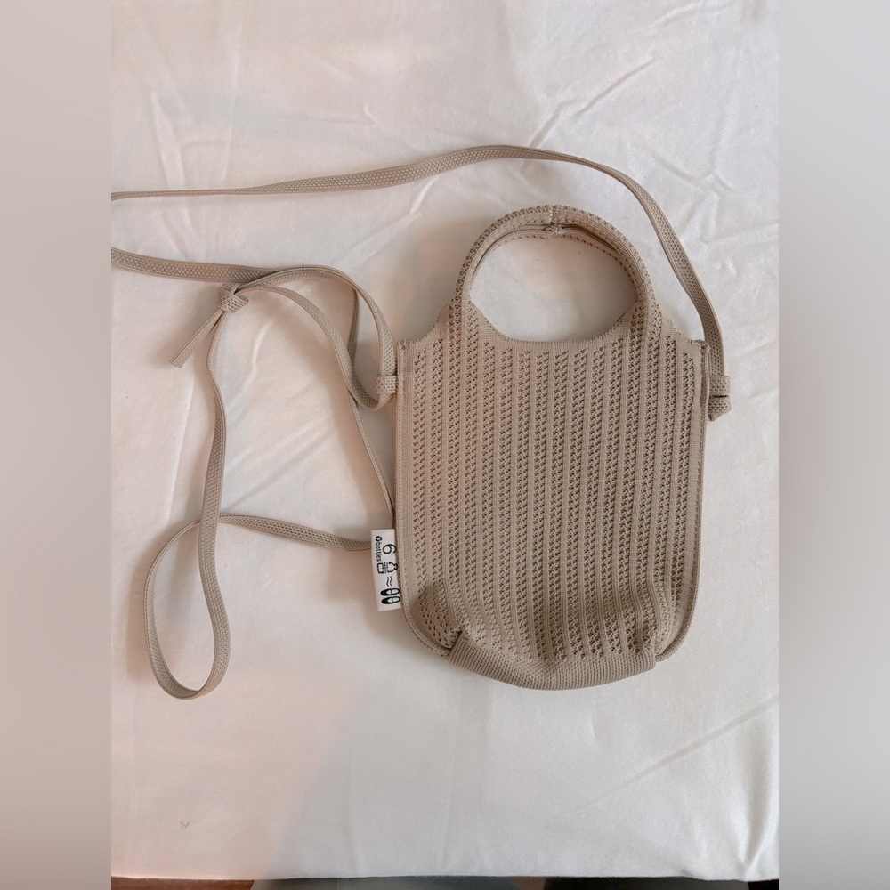 Vivaia mini Zahara flat adjustable cross body bag in Almond